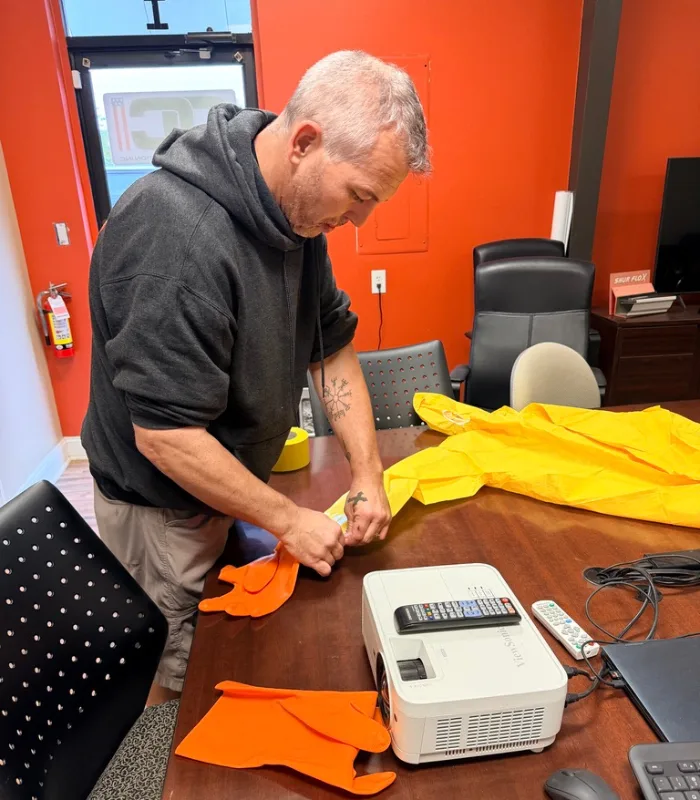 OCI Restoration technician at work on a restoration project