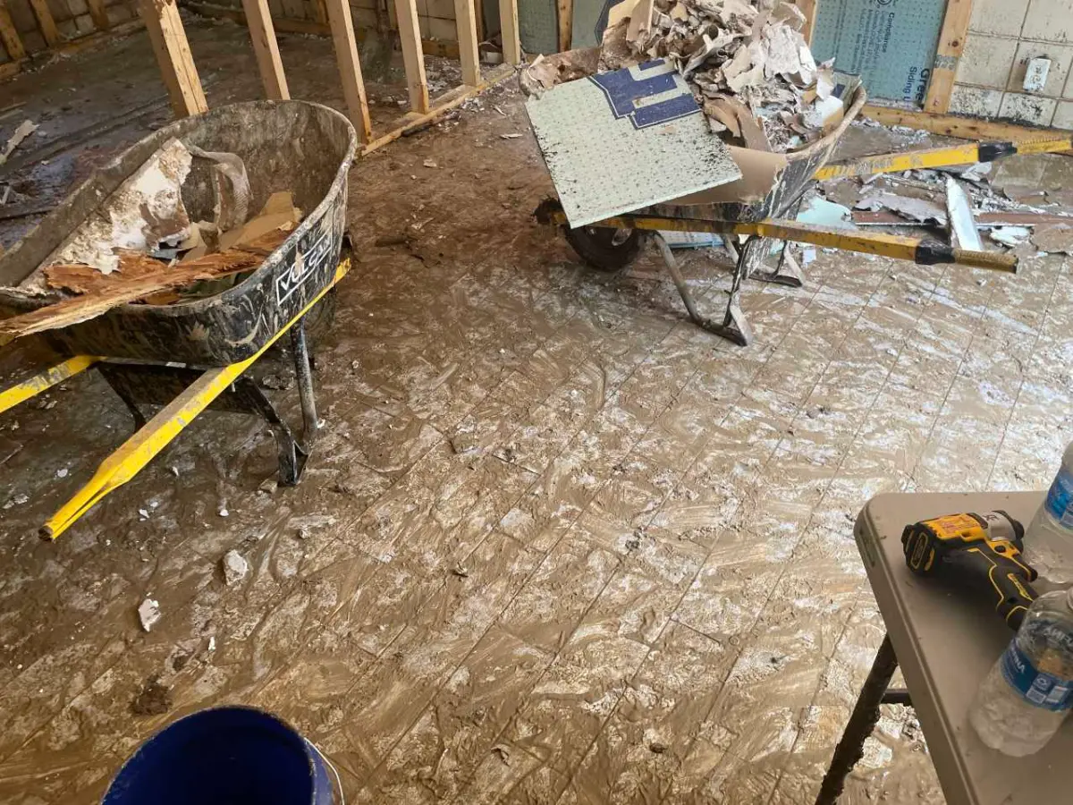 Debris removal underway during a storm damage cleanup